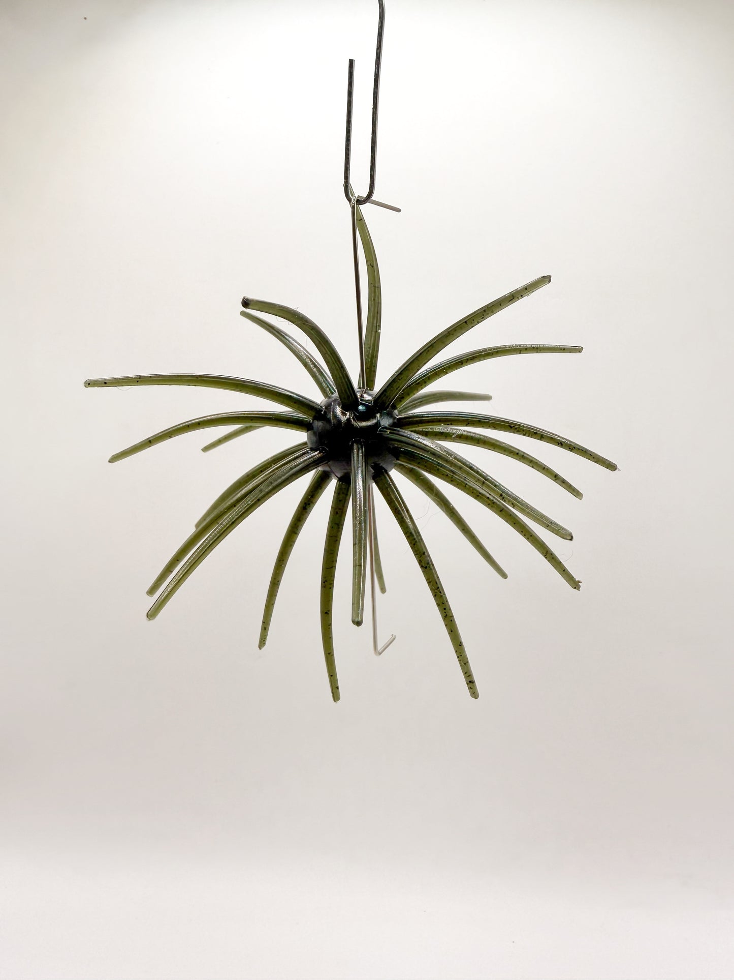 Hanging Green urchin lure on a white background